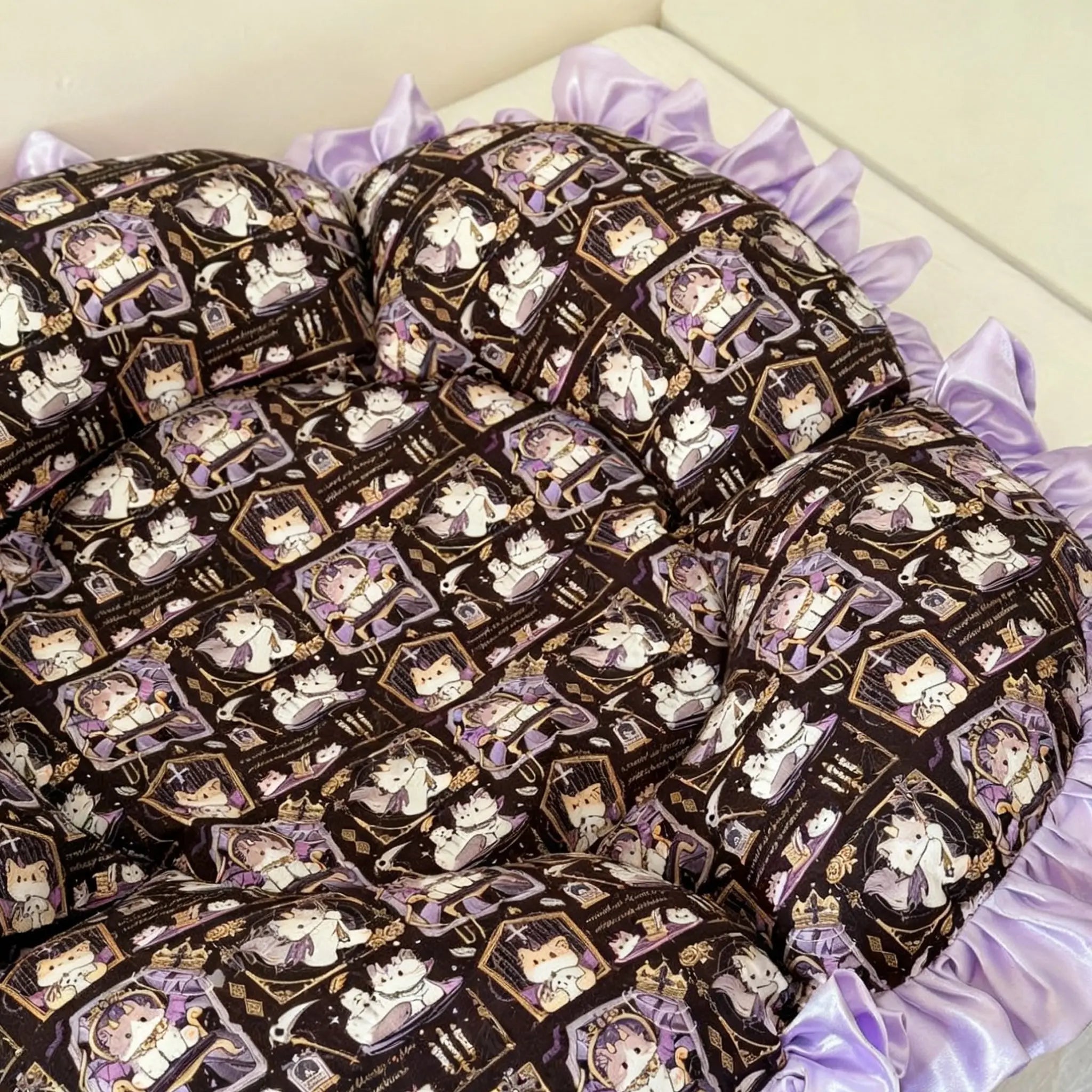 Detailed images of the purple petal cat bed showcase the breathable and scratch-resistant canvas fabric, printed cat pattern, and delicate purple satin lace.