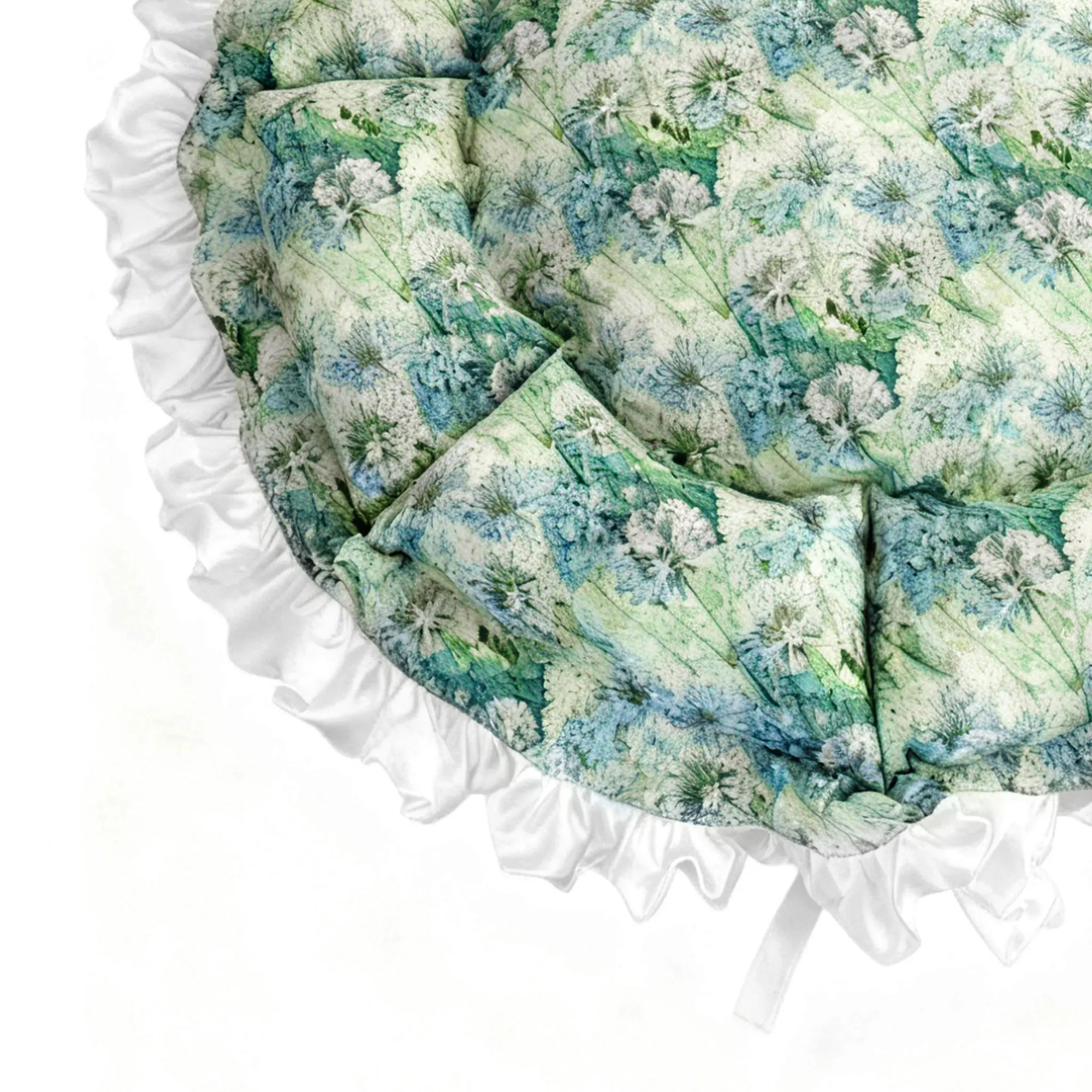 Detail view of texture and brush-stroke inspired print on garden oil painting style cat bed